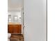 Clean bathroom with vanity, shower, and wood cabinets at 903 Aloha Way, Lady Lake, FL 32159
