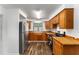 Updated kitchen featuring stainless steel appliances at 903 Aloha Way, Lady Lake, FL 32159