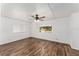 Bedroom with vinyl flooring and a large window at 903 Aloha Way, Lady Lake, FL 32159