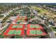 Well maintained tennis courts in a residential community at 9450 Se 130Th Place Rd, Summerfield, FL 34491