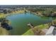 Serene lake with gazebo and walking path at 9450 Se 130Th Place Rd, Summerfield, FL 34491