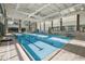 Resort-style swimming pool with ample lane space at 9450 Se 130Th Place Rd, Summerfield, FL 34491