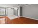 Hardwood floor entryway with double doors at 9450 Se 130Th Place Rd, Summerfield, FL 34491