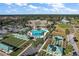Community pool and bocce ball courts at 9450 Se 130Th Place Rd, Summerfield, FL 34491