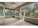 Sunroom with tiled floor and access to backyard at 9450 Se 130Th Place Rd, Summerfield, FL 34491