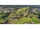 Aerial view of homes and golf course community at 9450 Se 130Th Place Rd, Summerfield, FL 34491