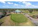Putting green next to clubhouse at 9450 Se 130Th Place Rd, Summerfield, FL 34491