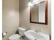 Simple bathroom with toilet and sink at 9450 Se 130Th Place Rd, Summerfield, FL 34491