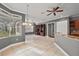 Kitchen with an island, breakfast nook, and built-in shelving at 9450 Se 130Th Place Rd, Summerfield, FL 34491