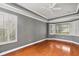 Spacious bedroom with hardwood floors and a ceiling fan at 9450 Se 130Th Place Rd, Summerfield, FL 34491