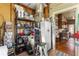 Well-stocked pantry with shelving and kitchen view at 10135 Se 108Th Terrace Rd, Ocala, FL 34472
