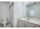 Bathroom with sink, shower, and toilet at 13552 Sw 81St Cir, Ocala, FL 34473
