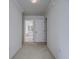 Bedroom with ensuite bathroom access and neutral decor at 13552 Sw 81St Cir, Ocala, FL 34473
