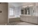 Double vanity bathroom with a large tub and shower at 13552 Sw 81St Cir, Ocala, FL 34473