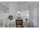 Cozy dining area with table and chairs by window at 13552 Sw 81St Cir, Ocala, FL 34473