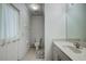 Bathroom with toilet, sink, and shower/tub combo at 13552 Sw 81St Cir, Ocala, FL 34473