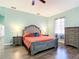 Serene bedroom with king-size bed and soft color scheme at 227 Locust Pass Crse, Ocala, FL 34472