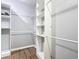 Spacious walk-in closet with ample shelving and hanging space at 227 Locust Pass Crse, Ocala, FL 34472