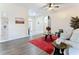 Open living area with hardwood floors and lots of natural light at 227 Locust Pass Crse, Ocala, FL 34472