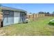 Large backyard with shed and wooden fence at 227 Locust Pass Crse, Ocala, FL 34472