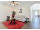 Open living area with a neutral color palette and plush seating at 227 Locust Pass Crse, Ocala, FL 34472
