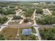 Aerial view showing the house and surrounding neighborhood at 227 Locust Pass Crse, Ocala, FL 34472