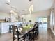 Elegant dining room with a large table and access to a patio at 227 Locust Pass Crse, Ocala, FL 34472