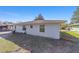 House exterior and backyard with AC unit at 1811 Ne 30Th St, Ocala, FL 34479