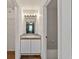 Clean bathroom with white tile, vanity, and bathtub at 1811 Ne 30Th St, Ocala, FL 34479