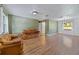 Spacious living room with hardwood floors and a neutral color scheme at 1811 Ne 30Th St, Ocala, FL 34479