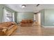 Spacious living room with hardwood floors and a neutral color scheme at 1811 Ne 30Th St, Ocala, FL 34479