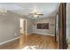Simple bedroom with wood floors and ceiling fan at 1811 Ne 30Th St, Ocala, FL 34479