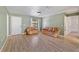 Spacious living room with hardwood floors and a neutral color scheme at 1811 Ne 30Th St, Ocala, FL 34479