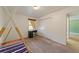 Spacious bedroom with teepee bed, closet and window at 1811 Ne 30Th St, Ocala, FL 34479
