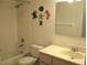 Clean bathroom with a shower/tub combo and vanity at 13644 Sw 115Th Ave, Dunnellon, FL 34432