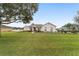 One-story house with a large grassy yard at 4736 Se 34Th St, Ocala, FL 34480