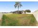 Spacious backyard with lush lawn, offering plenty of space for outdoor activities at 4736 Se 34Th St, Ocala, FL 34480