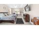 Spacious Primary bedroom with king-size bed, dresser, and ceiling fan at 4736 Se 34Th St, Ocala, FL 34480