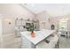Open concept kitchen with large island and white quartz countertops at 4736 Se 34Th St, Ocala, FL 34480