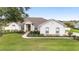 One-story home with light colored exterior, landscaping, and driveway at 4736 Se 34Th St, Ocala, FL 34480