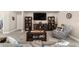 Living room with a large TV and comfortable seating at 4736 Se 34Th St, Ocala, FL 34480