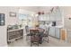 Cozy breakfast nook with a round table and chairs, adjacent to the kitchen at 4736 Se 34Th St, Ocala, FL 34480