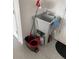 Convenient utility sink with mop sink and storage in the garage at 10201 Sw 96Th Loop, Ocala, FL 34481