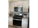 Well-equipped kitchen with stainless steel appliances at 10201 Sw 96Th Loop, Ocala, FL 34481