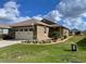 Two-story home with attached garage and landscaping at 10201 Sw 96Th Loop, Ocala, FL 34481