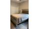 Bright bedroom with a plush bed and large closet at 10201 Sw 96Th Loop, Ocala, FL 34481