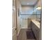 Elegant bathroom with double vanity, large shower and modern fixtures at 10201 Sw 96Th Loop, Ocala, FL 34481