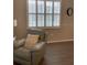 Relaxing living room featuring a comfortable recliner at 10201 Sw 96Th Loop, Ocala, FL 34481