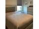 Spacious bedroom with a queen-size bed and dresser at 10201 Sw 96Th Loop, Ocala, FL 34481