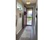 Light and bright entryway with wood-look flooring at 10201 Sw 96Th Loop, Ocala, FL 34481